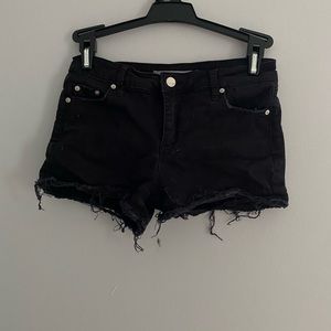black mid rise shorts